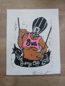 print by Wanda Ewing "Sue" depicting woman with punching bag head