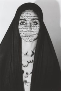 portrait of a woman with writing on her face