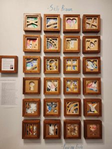 24 small drawings with wooden frames